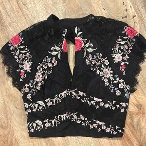 Free people embroidered top. Never worn. Tags on